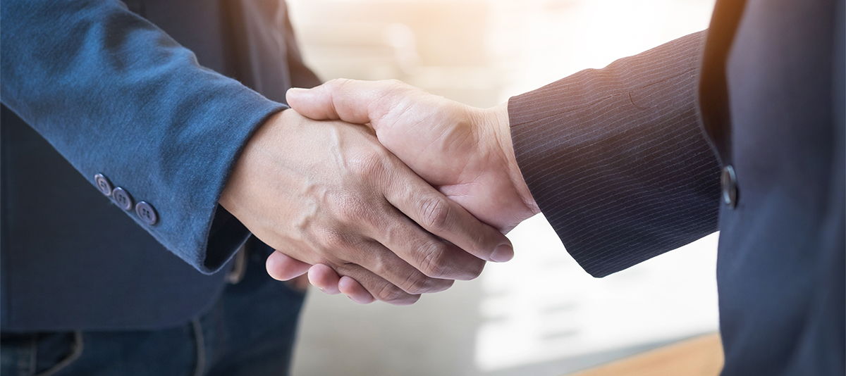 two confident business man shaking hands during meeting office success dealing greeting partner concept2