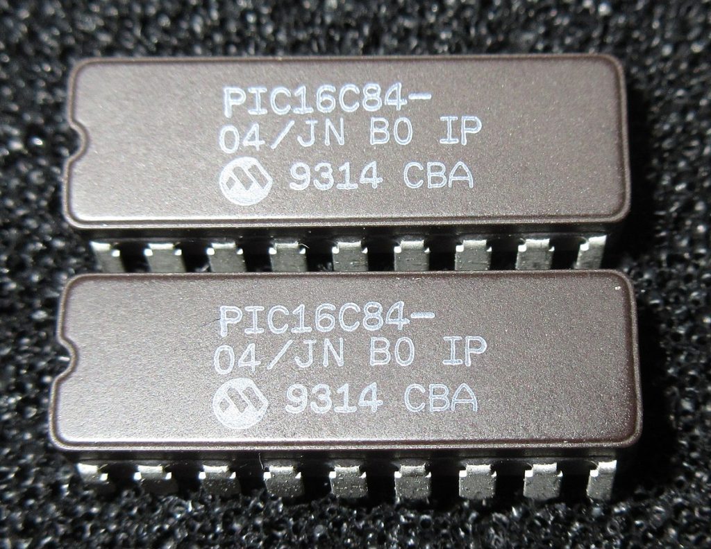 Two Microchip PIC16C84 chips